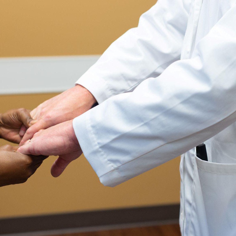 Dr Jeff Brown with a Patient at Semmes Murphey Web