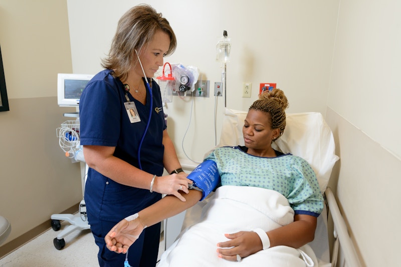 Nurse Treating a Patient