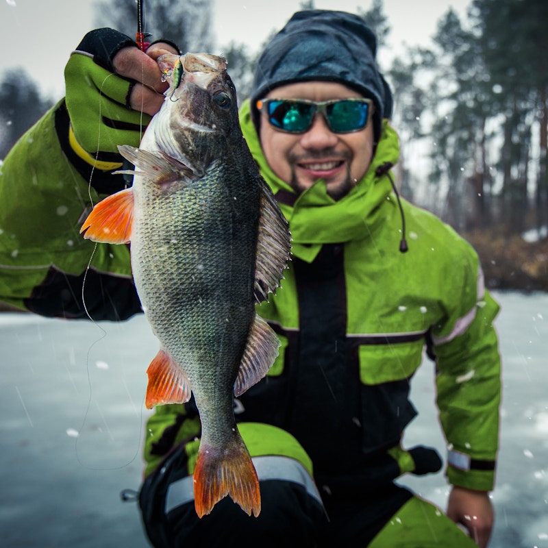 Man fishing winter square