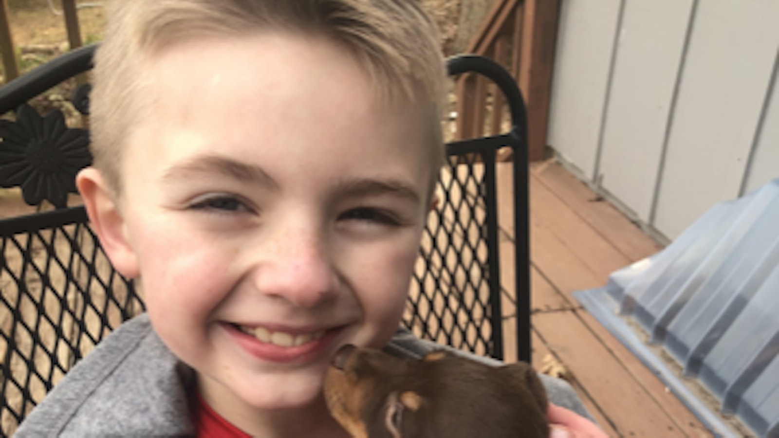 Semmes Murphey Patient Landon and His Puppy